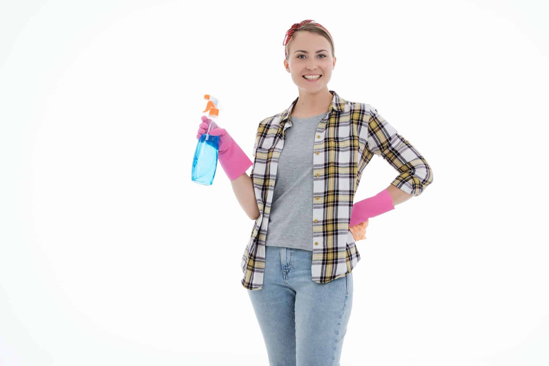 A smiling professional cleaner, showing why cleaners need a website