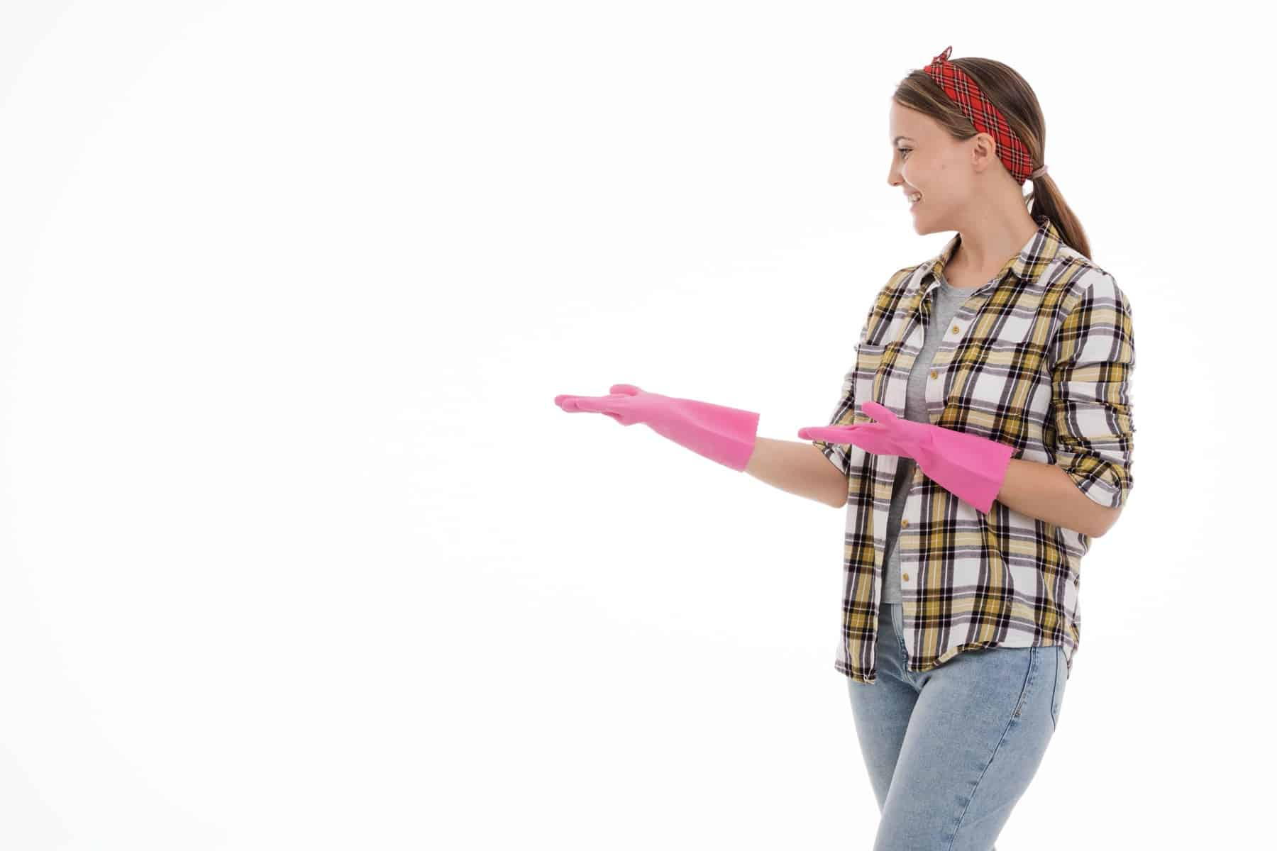 A smiling professional cleaner ready to take on more cleaning clients